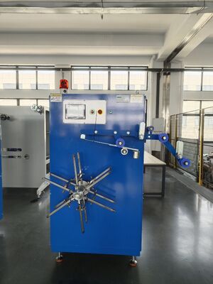 Enrollador de corte de alimentación automática